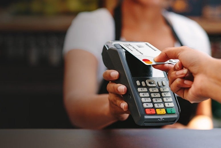 customer-paying-bill-using-card-1300x650.jpg